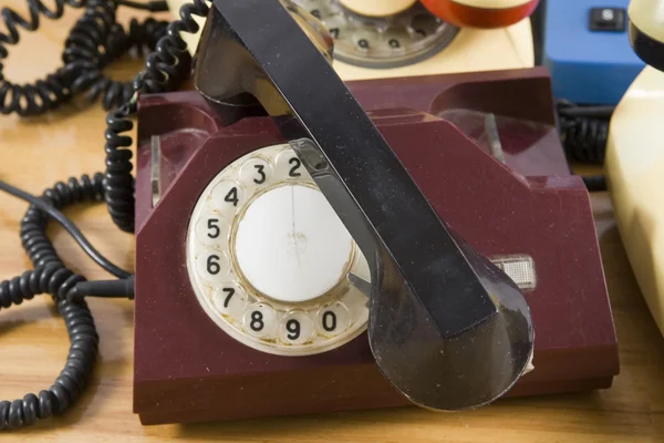 Old telephone with rotary dial Stock Photo