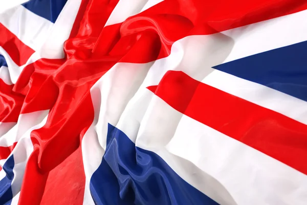 Flapping flag Reino Unido con ola — Foto de Stock