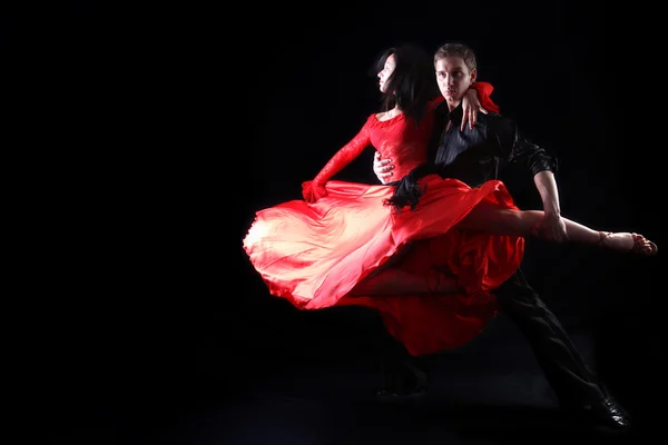 Dancers against black background — Stock Photo, Image