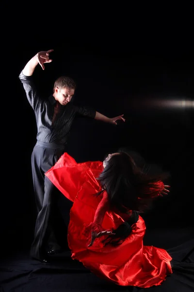 Dancers against black background Stock Image