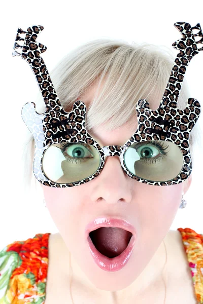 Sirprised girl in funny glasses Stock Picture
