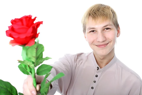 Man med röd blomma — Stockfoto