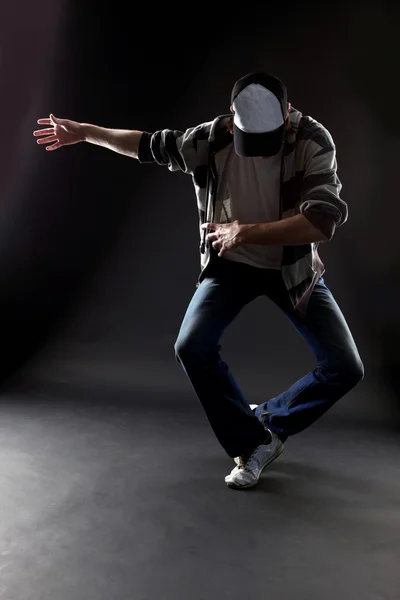 Modern man dancer against Stock Image