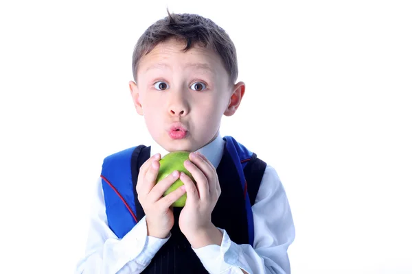 Estudante surpreso com maçã — Fotografia de Stock