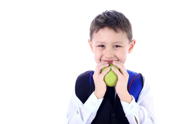 Colegial con mochila y manzana —  Fotos de Stock