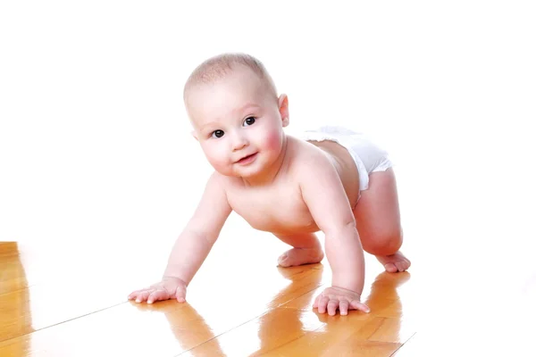 Glimlachende baby 6 maanden oud in luier — Stockfoto