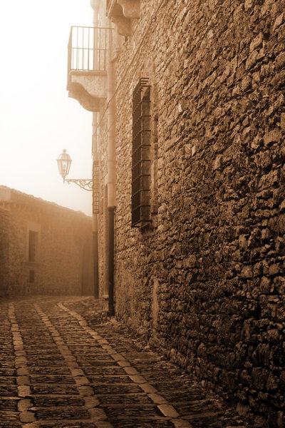 Old Italy ,Sicily, highlands, fog in Eriche city