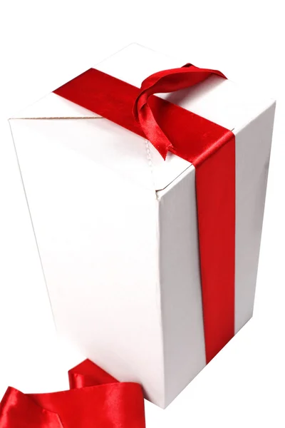White box with gift with red tape — Stock Photo, Image