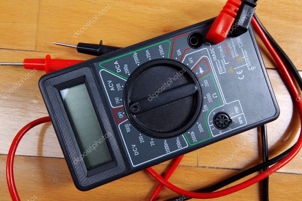 Multimeter at table Stock Photo by ©konstantin32 2495212