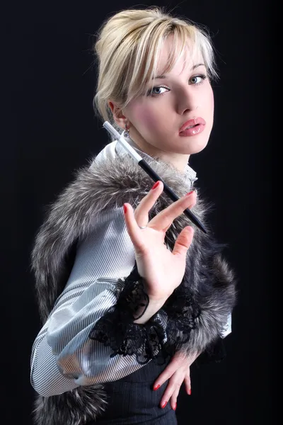 Girl with fur and cigarette — Stock Photo, Image