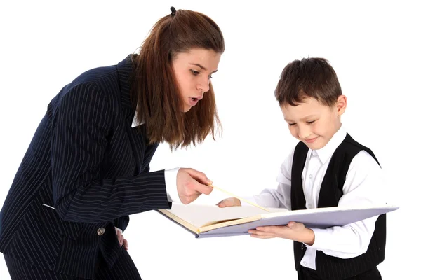 Teacher and boy with book — Stock Photo, Image