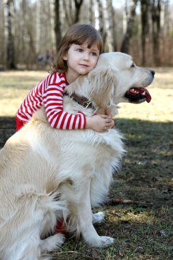 Little girl with big retriever outdoor clipart