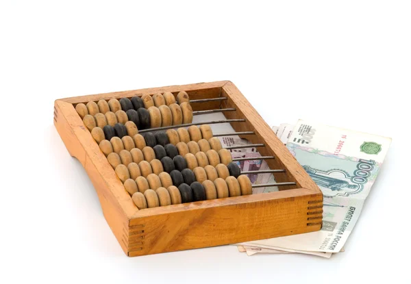 Denominations and an abacus. — Stock Photo, Image