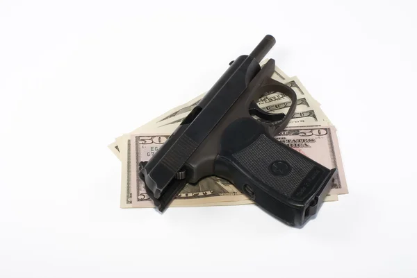 Pistol and dollars — Stock Photo, Image