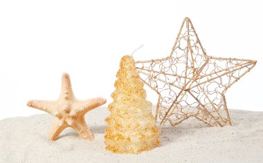 Christmas on a beach with stars clipart