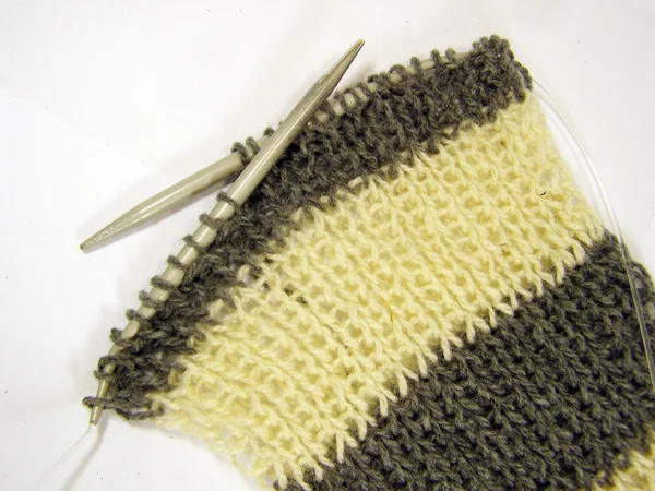 Stock image Scarf is knit by needle