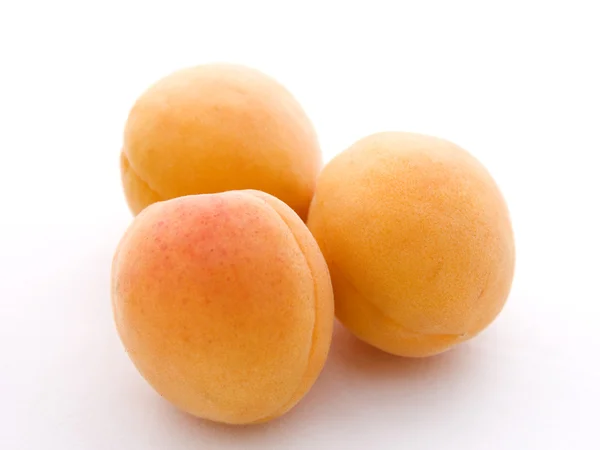 Three apricots — Stock Photo, Image