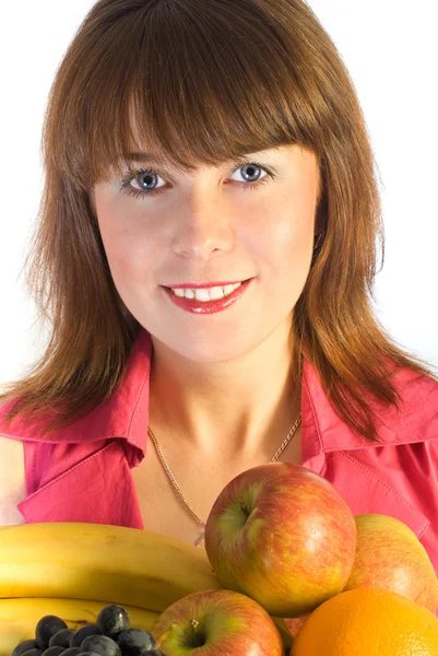 Menina sorridente com prato de frutas — Fotografia de Stock