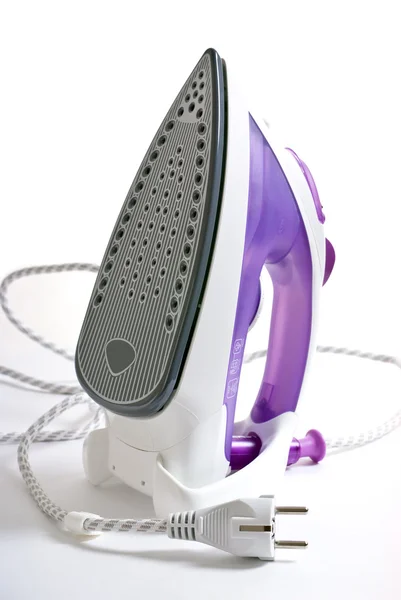 Purple smoothing-iron — Stock Photo, Image