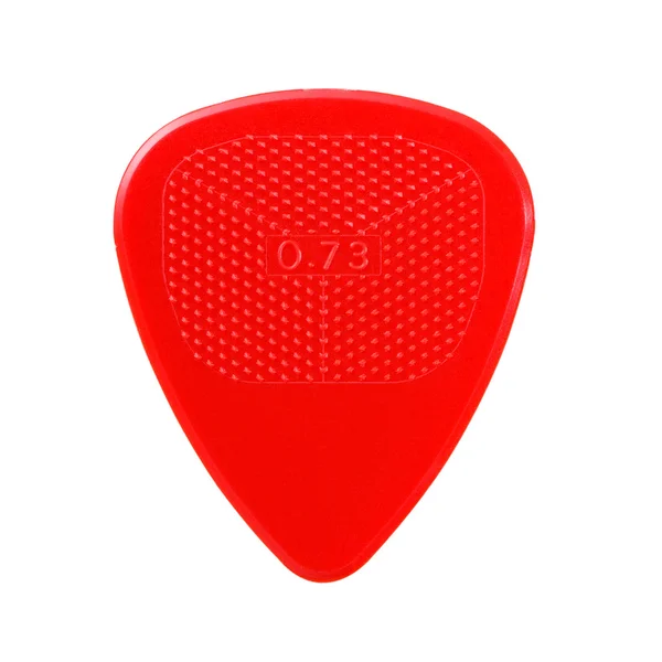Red ribbed guitar plectrum — Stock Photo, Image
