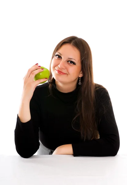 Mujer joven sonriente con manzana —  Fotos de Stock