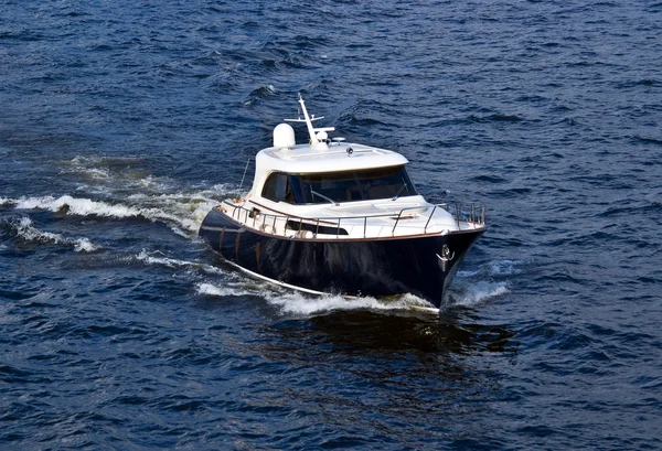 stock image Fast white motor boat on blue water