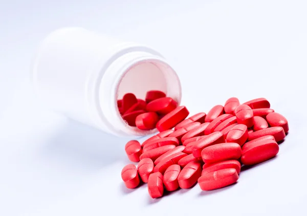 Crimson pills — Stock Photo, Image