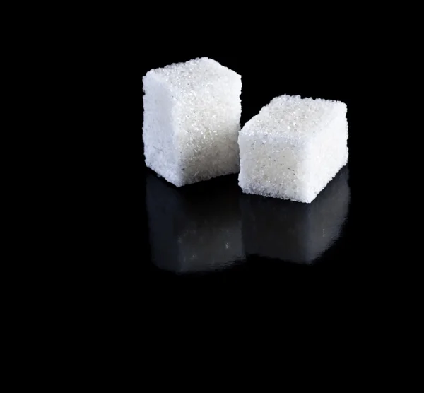 Açúcar em preto — Fotografia de Stock