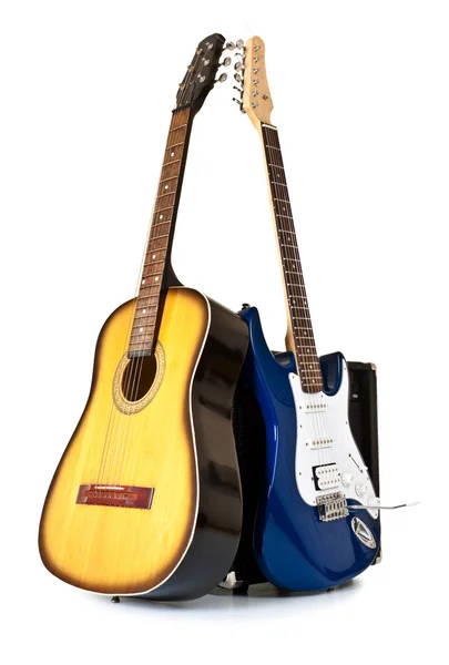 Acoustic and electric guitars — Stock Photo, Image