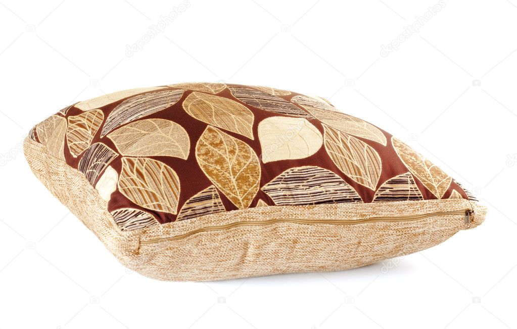 Brown pillow with leaves pattern