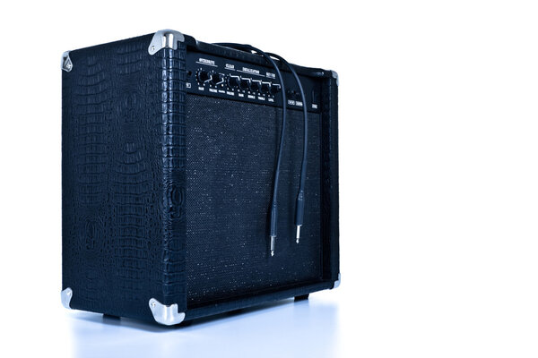 Black guitar amplifier isolated on white, tinted