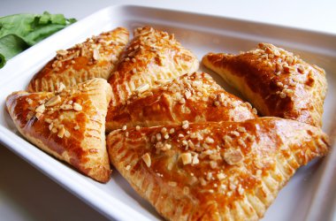 Puff-pastry pasties filled in fresh sorr clipart