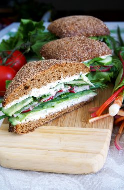 Healthy rye bread cutted sandwich with r clipart