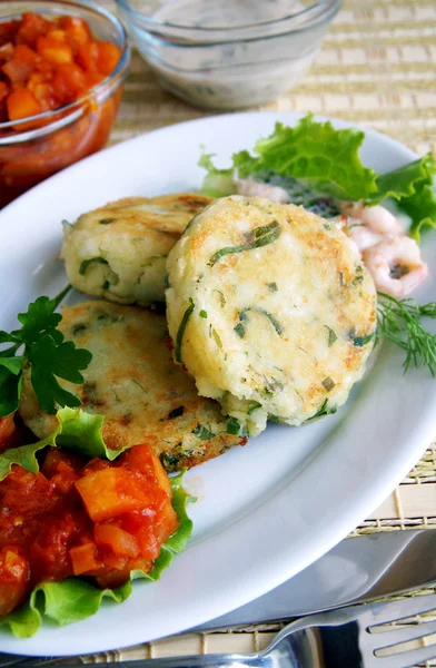 Potato and greens cakes with two sauces — Stock Photo, Image