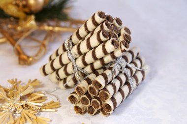 Stacks of chocolate logs for Xmas clipart
