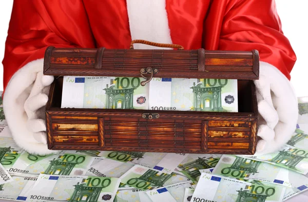 Box with money in Santa Claus hand. — Stock Photo, Image