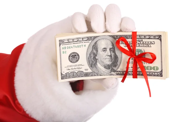 Geld in de hand van de Kerstman. — Stockfoto