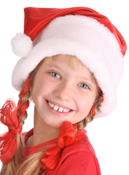 Lachende meisje in hoed van santa claus. — Stockfoto