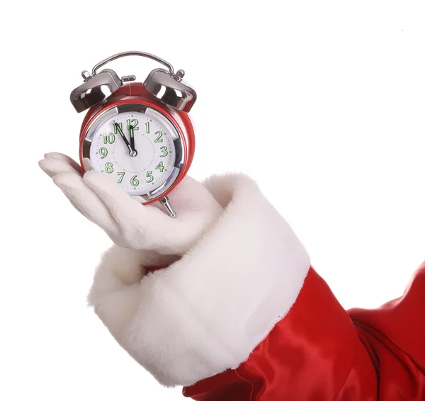 Alarm clock on palm of Santa Claus. — Stock Photo, Image