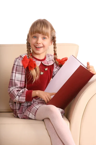 Girl sit in armchair and read book. — Stock Photo, Image
