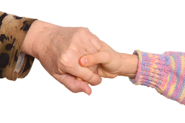 Grandmother and granddaughter hold hands — Stock Photo, Image