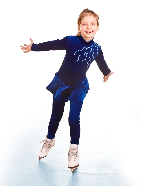 Menina em vestido esporte azul em patins . — Fotografia de Stock