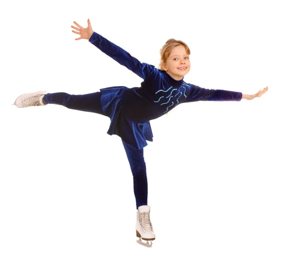 Menina em vestido azul em patins . — Fotografia de Stock