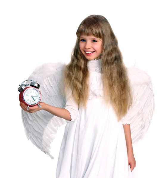 Kız melek kostümü ile masa saati. — Stok fotoğraf
