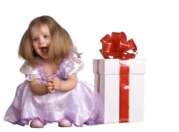 Girl in costume of doll with gift box. Stock Image