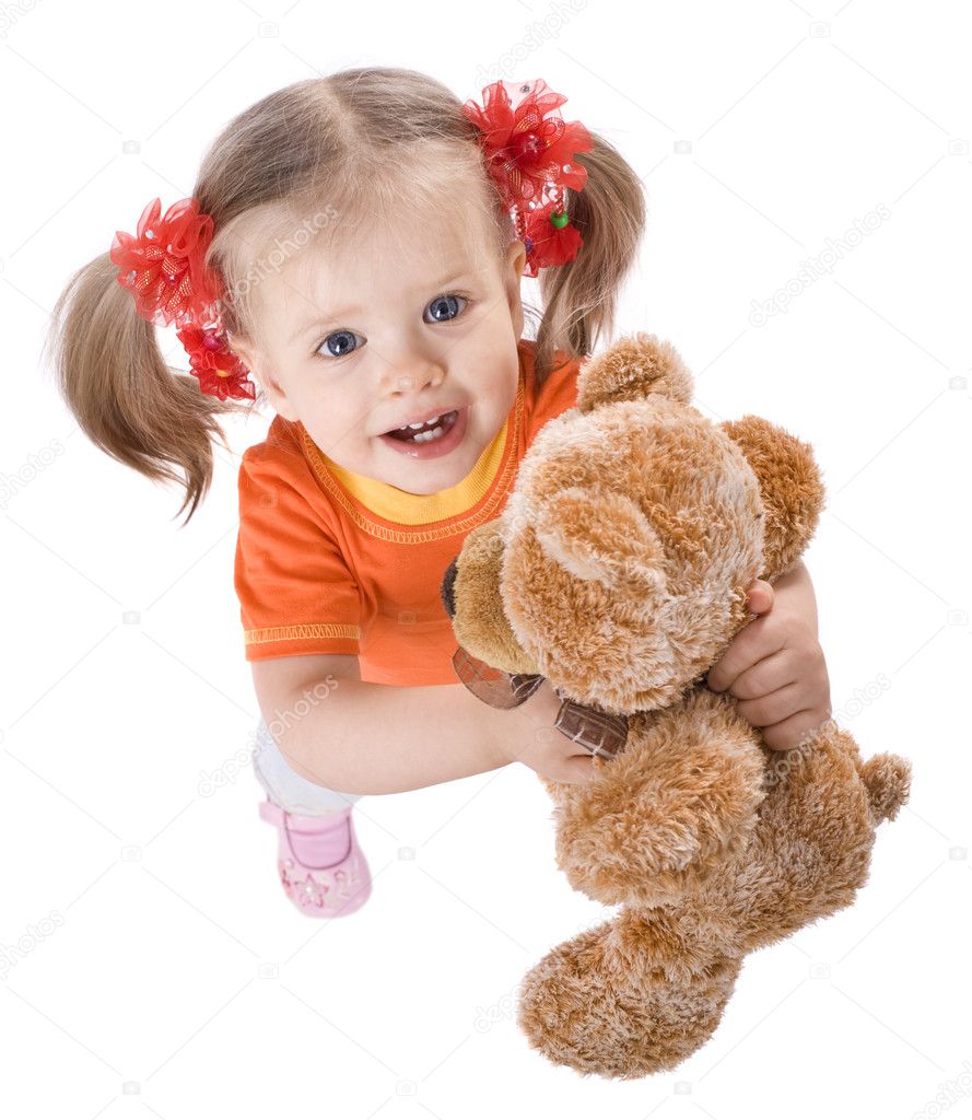Girl in orange with toy.