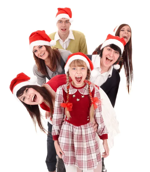 Gelukkig groep in Kerstman hoed. — Stockfoto