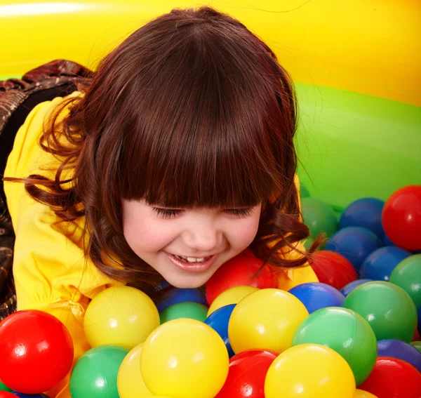 Little girl with group ball. — Stock Photo, Image
