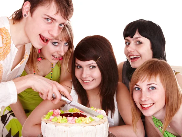 Group of teenagers with cake — Stock Photo, Image