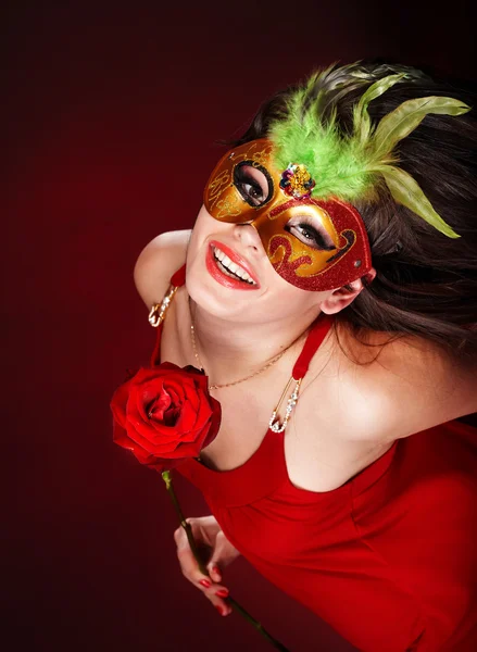 Girl with red rose and mask. — Stock Photo, Image